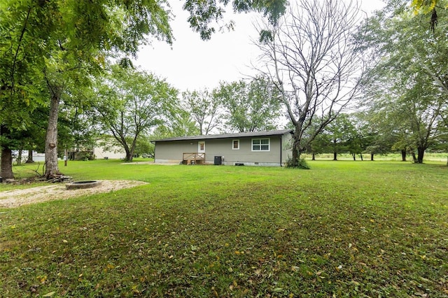 view of yard featuring central AC