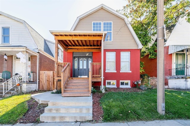 view of front of property featuring a front yard