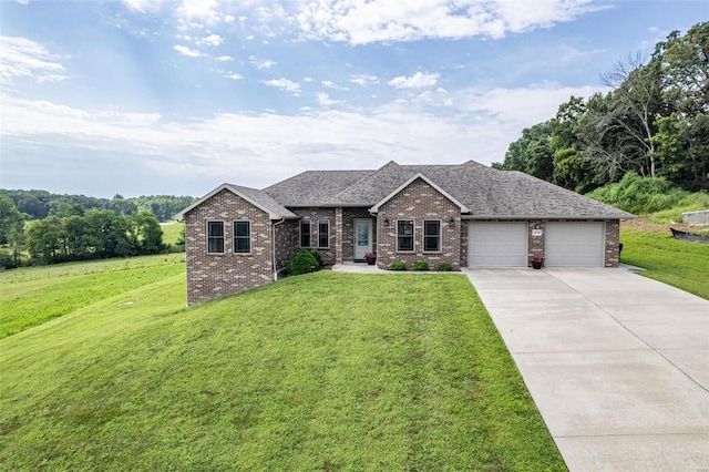 single story home with a garage and a front yard