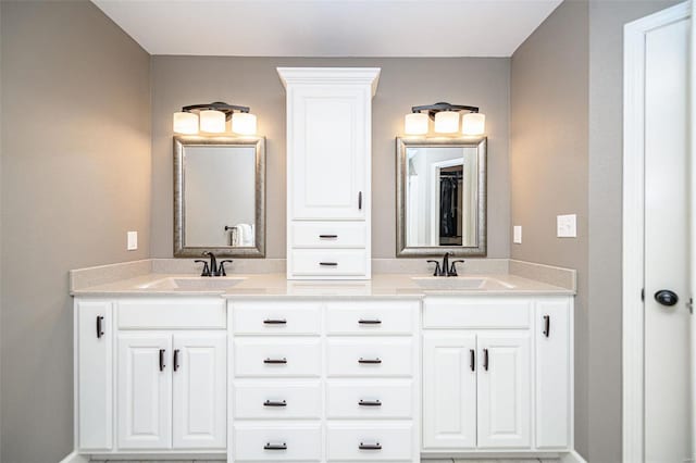 bathroom featuring double vanity