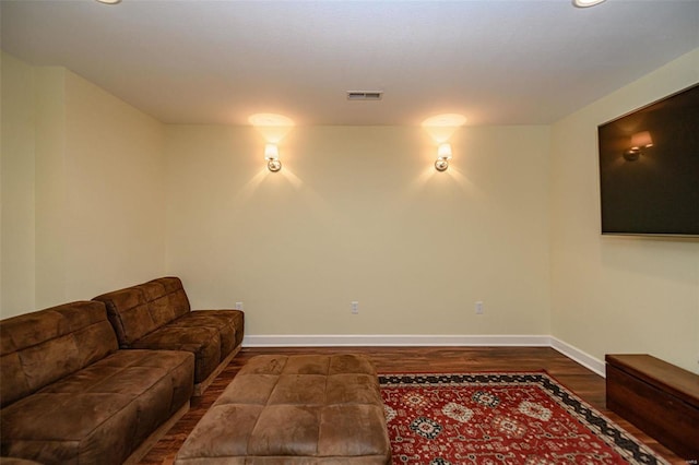 living room with dark hardwood / wood-style floors