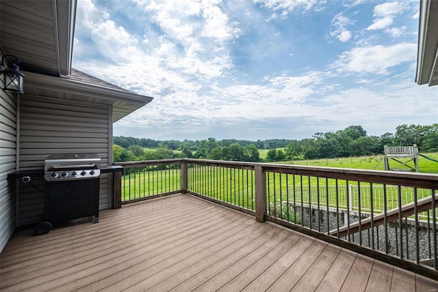 wooden deck with a yard