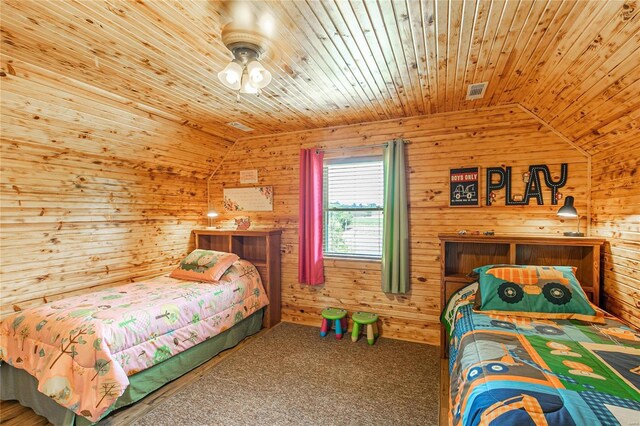 bedroom featuring wood walls, lofted ceiling, and wood ceiling