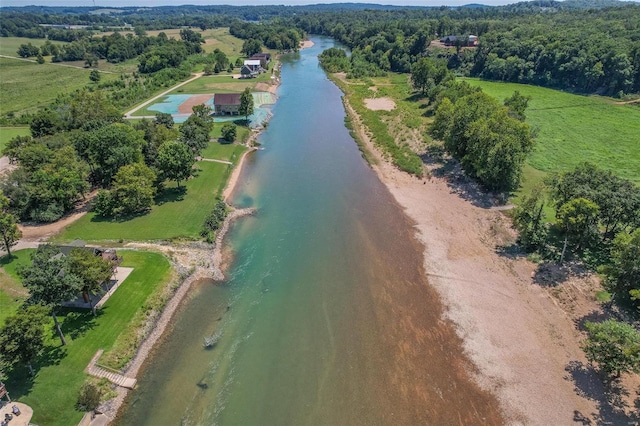 drone / aerial view with a water view and a rural view