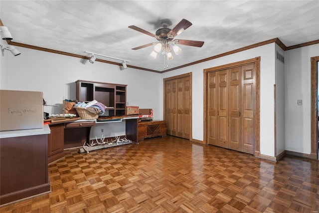 office space featuring parquet floors, ceiling fan, and crown molding