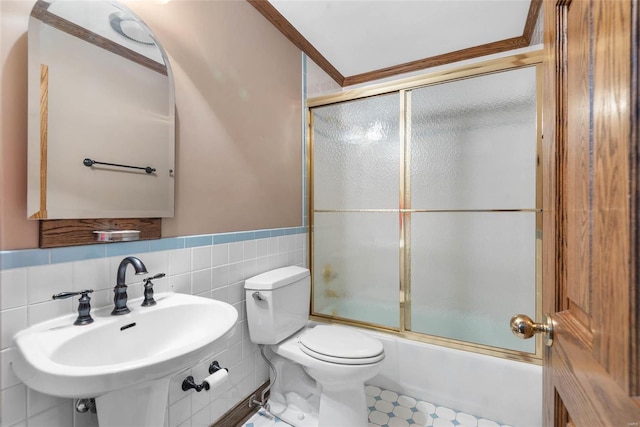 full bathroom with backsplash, toilet, ornamental molding, sink, and enclosed tub / shower combo