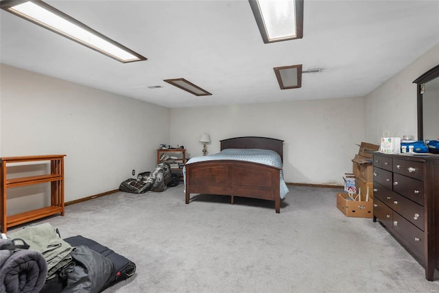 bedroom featuring light colored carpet