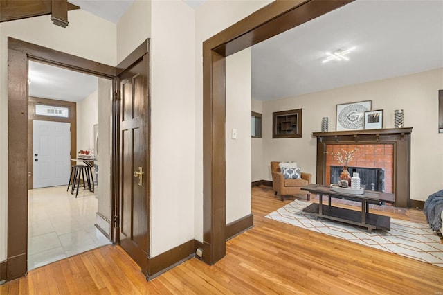 hall with light wood-type flooring