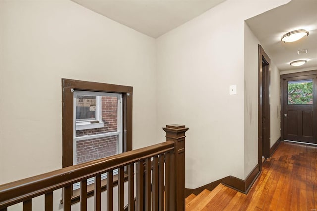 hallway featuring hardwood / wood-style floors