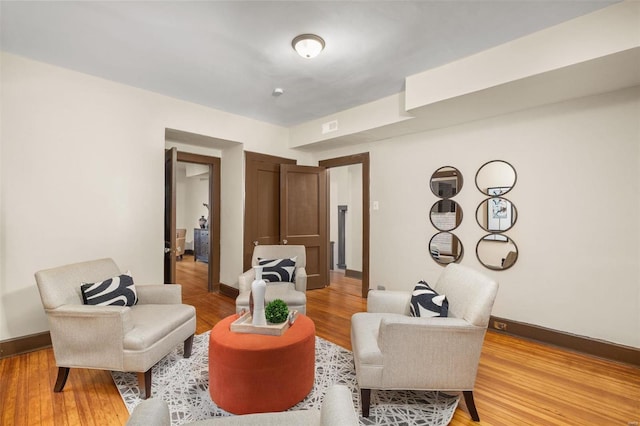 sitting room featuring light wood-type flooring