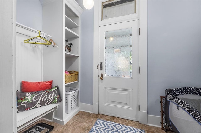 mudroom featuring light tile patterned floors