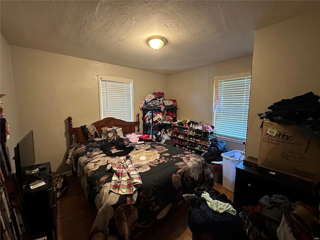 bedroom featuring a textured ceiling