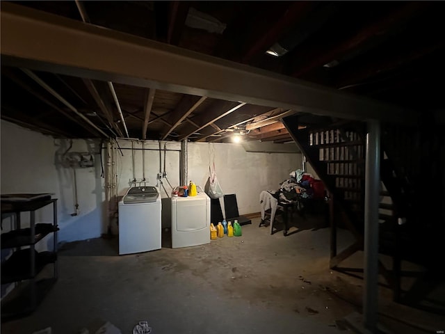 basement with washing machine and clothes dryer