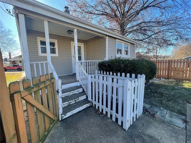 entrance to property with covered porch