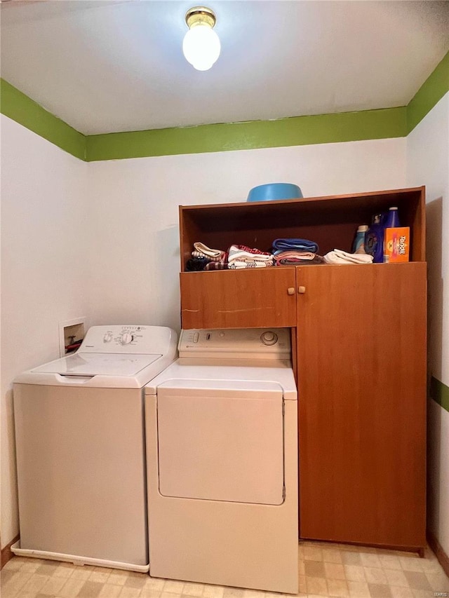 laundry room featuring washing machine and dryer