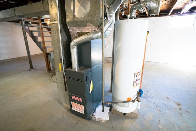 utility room with water heater and heating unit