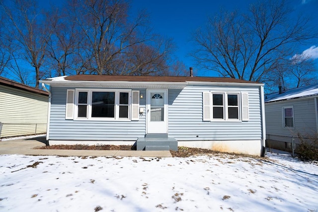 view of front of property featuring fence and entry steps