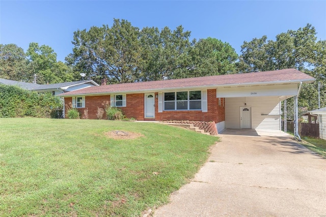 ranch-style house with a front lawn and a carport