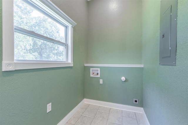 laundry area with hookup for a washing machine, electric panel, and electric dryer hookup