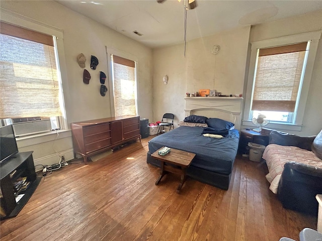 bedroom with wood-type flooring