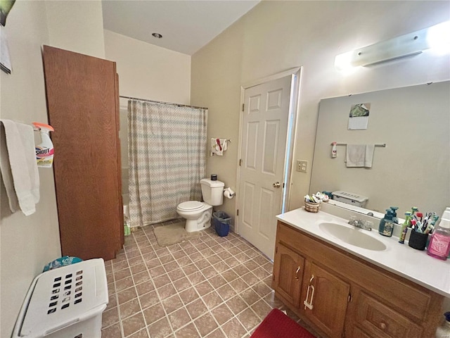 bathroom featuring vanity, tile patterned floors, toilet, and a shower with shower curtain