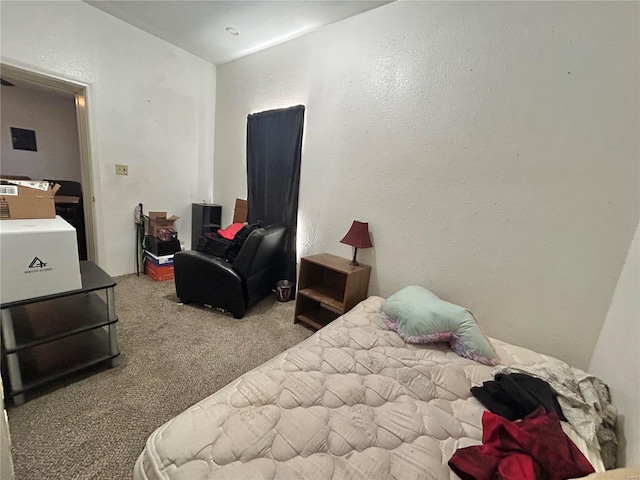 bedroom featuring carpet flooring