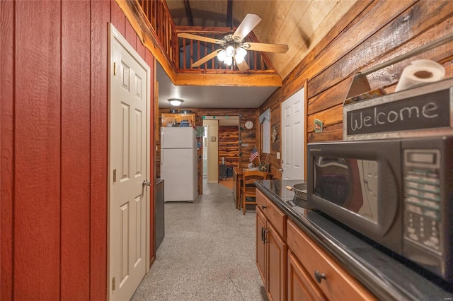 hall with wood ceiling and log walls