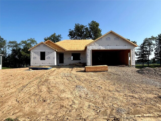 property under construction with a garage