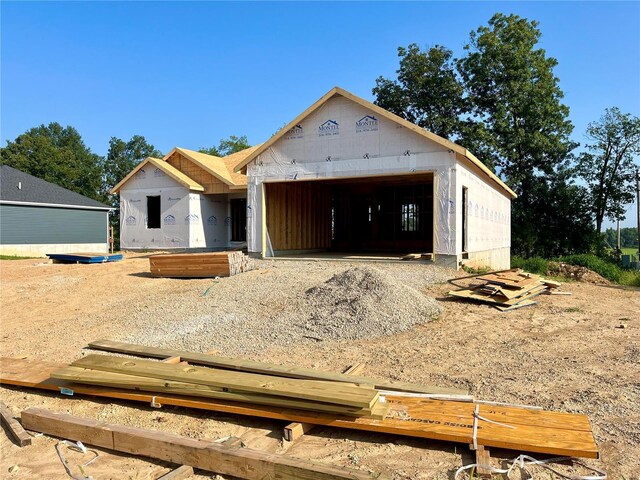 property under construction featuring an outdoor structure