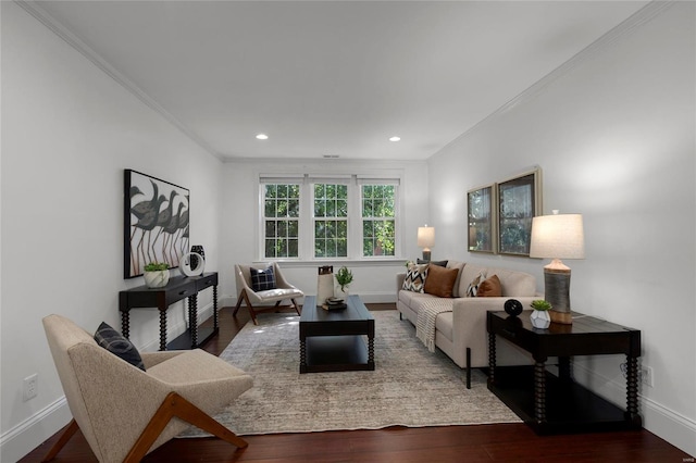 living area with crown molding, recessed lighting, wood finished floors, and baseboards