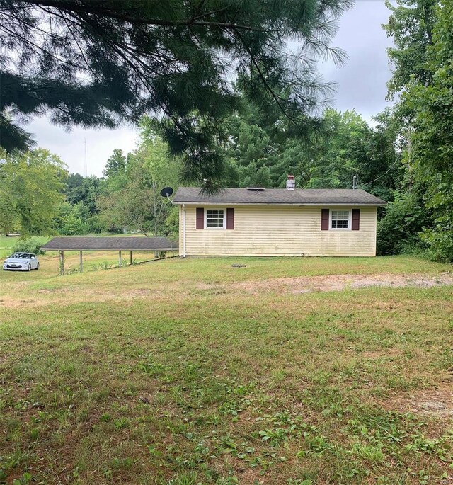 exterior space featuring a front lawn