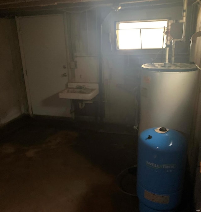 basement with sink and water heater