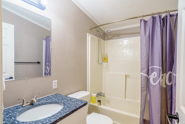 full bathroom featuring ornamental molding, vanity, shower / tub combo with curtain, and toilet