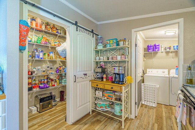 pantry with washing machine and clothes dryer