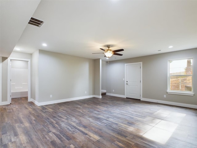 bonus room with ceiling fan and hardwood / wood-style flooring