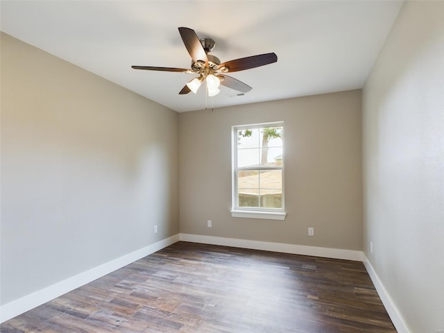 spare room with ceiling fan and hardwood / wood-style floors