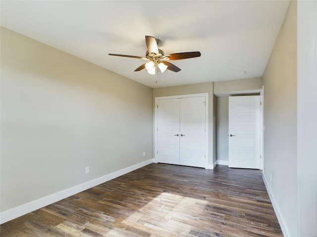 unfurnished bedroom featuring ceiling fan and hardwood / wood-style floors