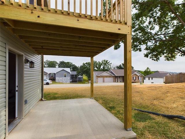 view of patio / terrace with a garage