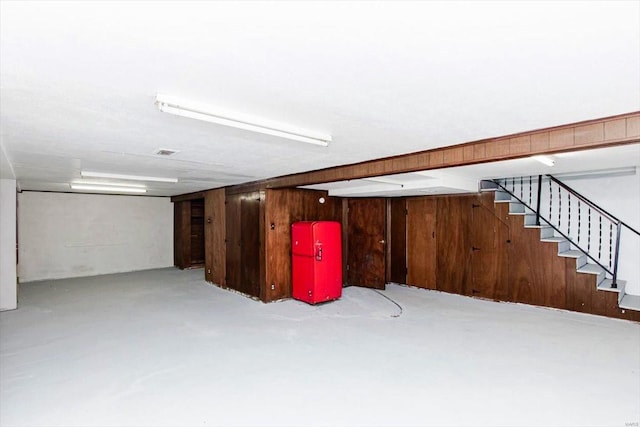 basement with wooden walls