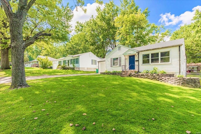 ranch-style house with a front lawn