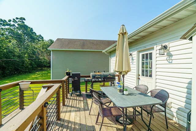 deck with a yard and outdoor lounge area