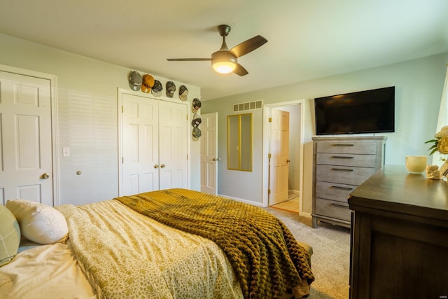 carpeted bedroom featuring ceiling fan