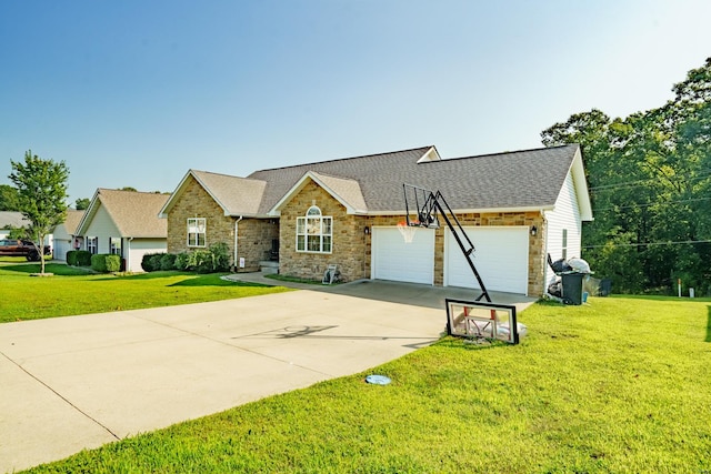 view of front of property with a garage and a front lawn