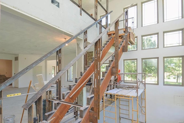stairs with a high ceiling