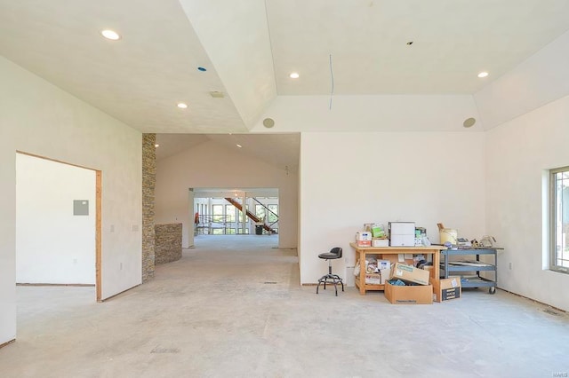 misc room with high vaulted ceiling