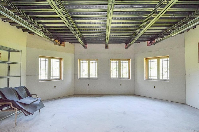 interior space with plenty of natural light and concrete floors