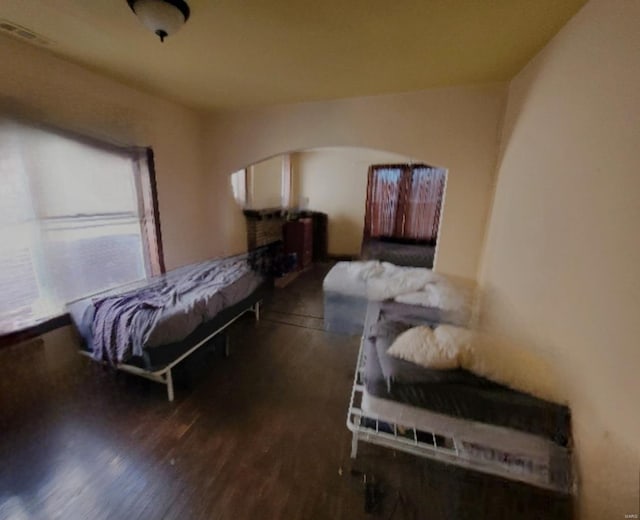 bedroom featuring wood-type flooring