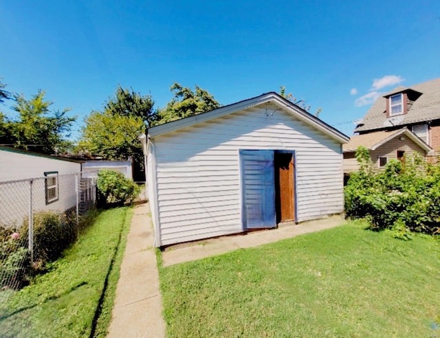 view of outdoor structure with a yard