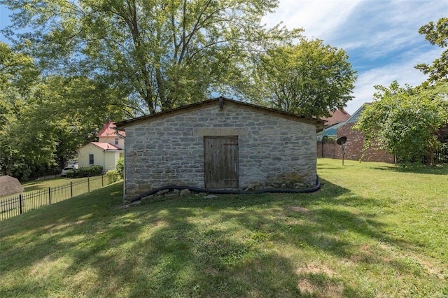 view of outdoor structure with an outdoor structure and fence