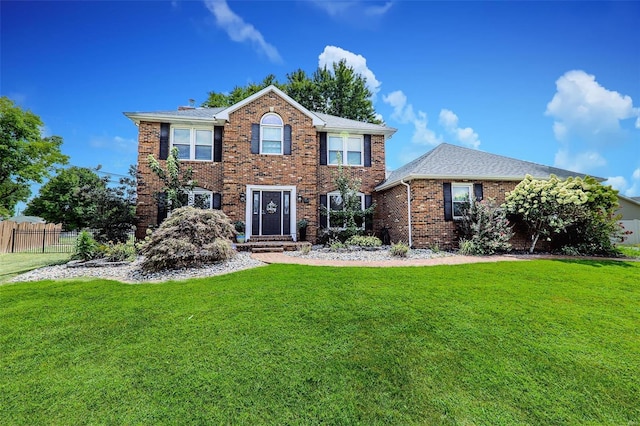 view of front of property with a front lawn